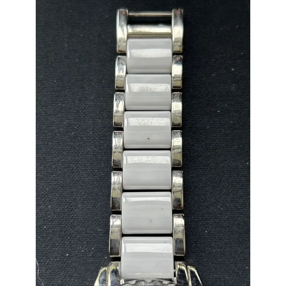 Burgi White And Silver Tone Rhinestone Bezel Women’s Quartz Watch